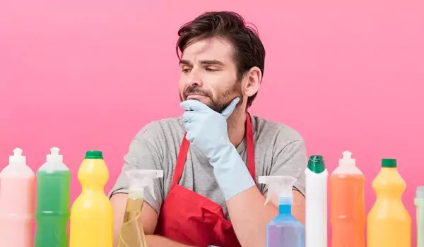 young man with some chemical cleaners