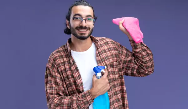Man doing cleaning with microfiber cloth