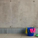 Cleaning supplies against the wall