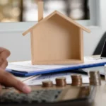 The concept of home ownership business people negotiating a contract this is where you need to sign