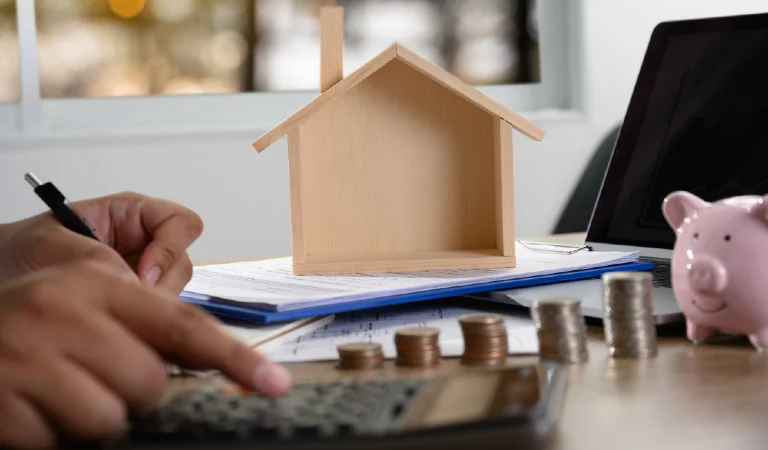 The concept of home ownership business people negotiating a contract this is where you need to sign