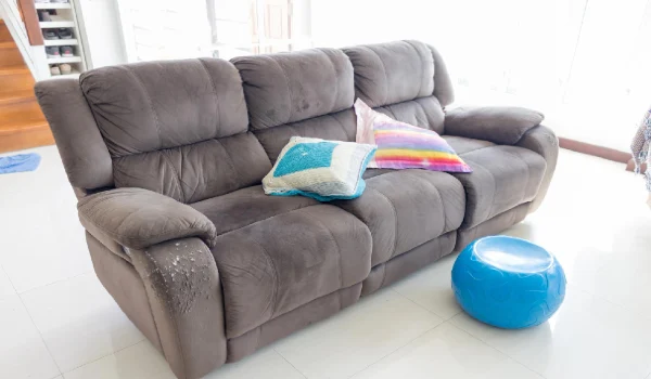 damaged sofa chair leather home indoors seat